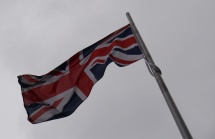 The Union Jack flying on a gray London afternoon.