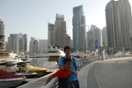 Aidan and Nathan are melting on our walk around Dubai Marina.