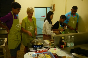 Bailey-Shah family working together in the kitchen